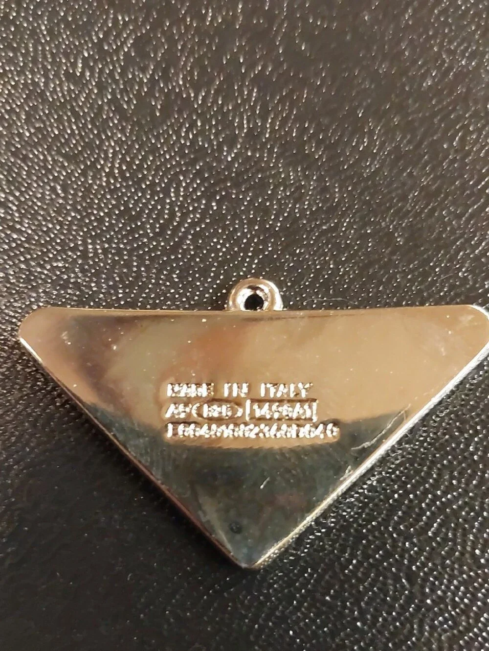 Prada Black and Silver Triangular Logo Pendant